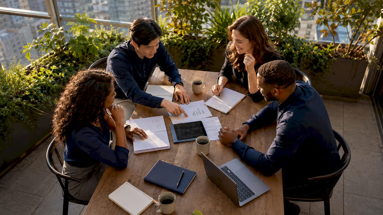 Brand innovation best practices: a guide for brand managers 2 • MB Brand Communications Cross-functional team discussing innovation strategies