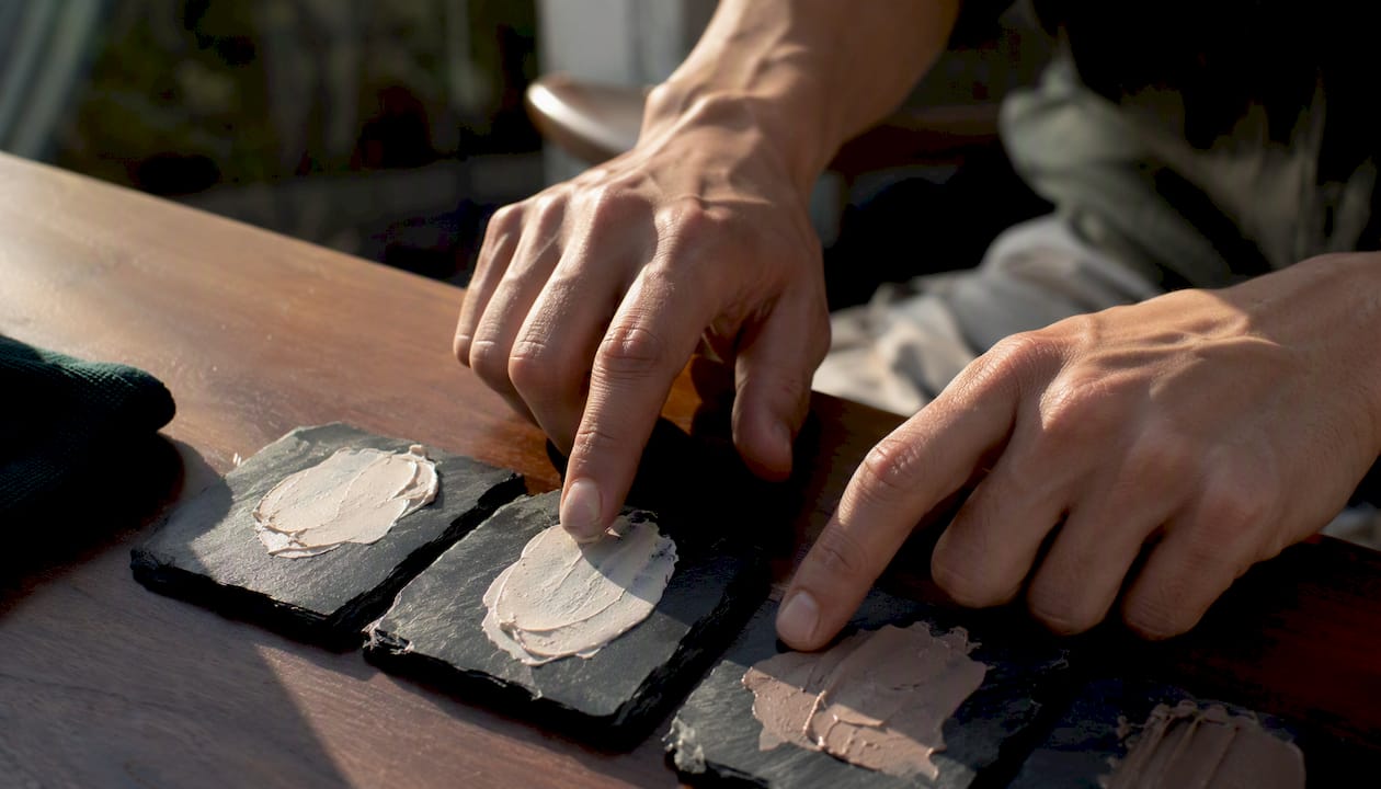 Close-up of cream makeup textures and skin tint samples