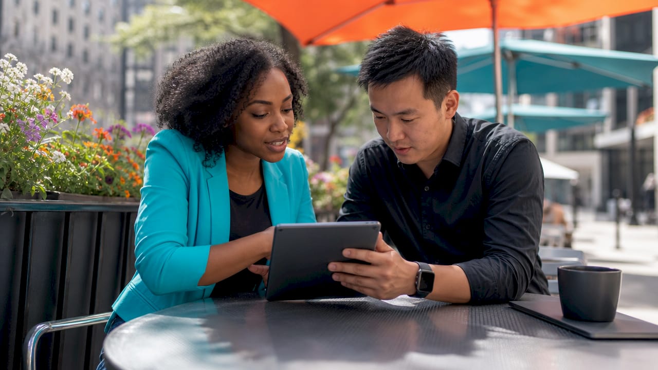 Pair discussing social media platform choices