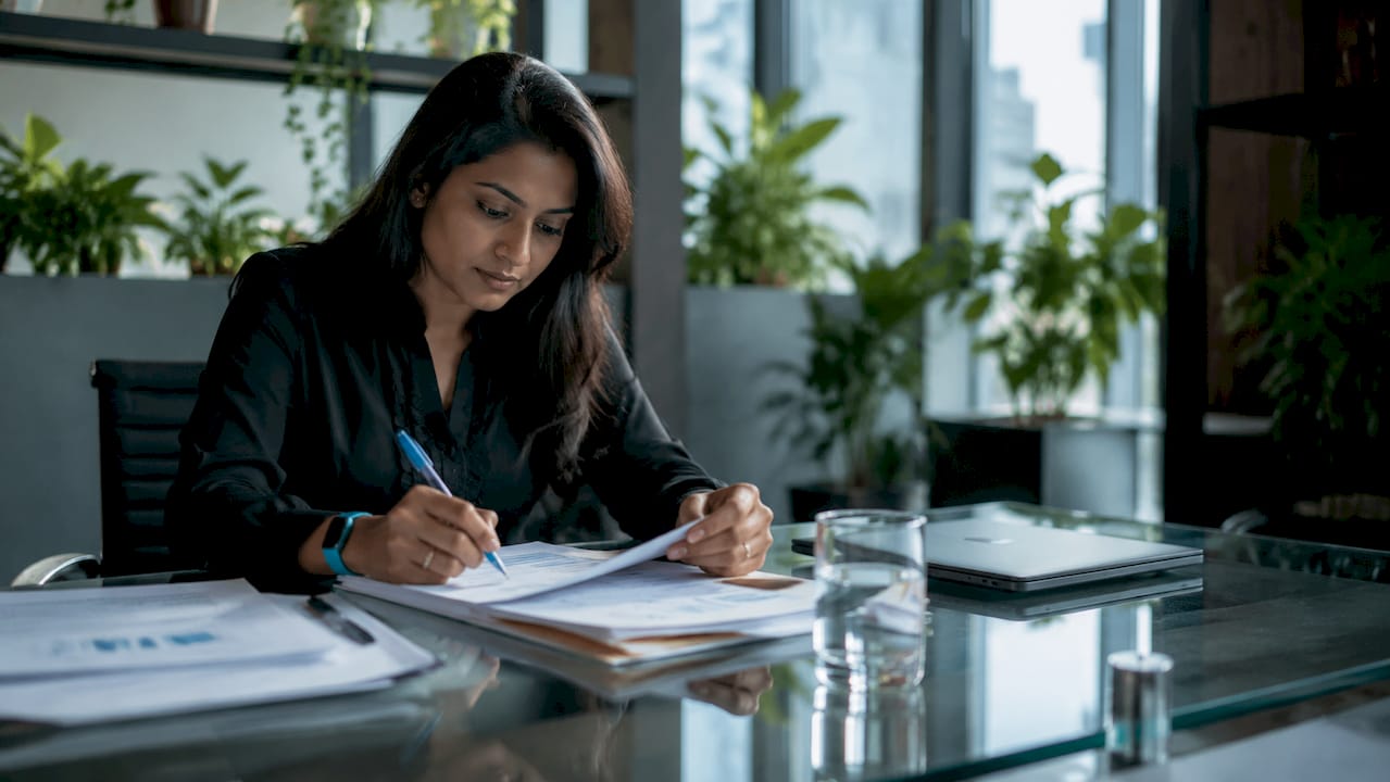 Specialist reviewing peptide exclusivity documents