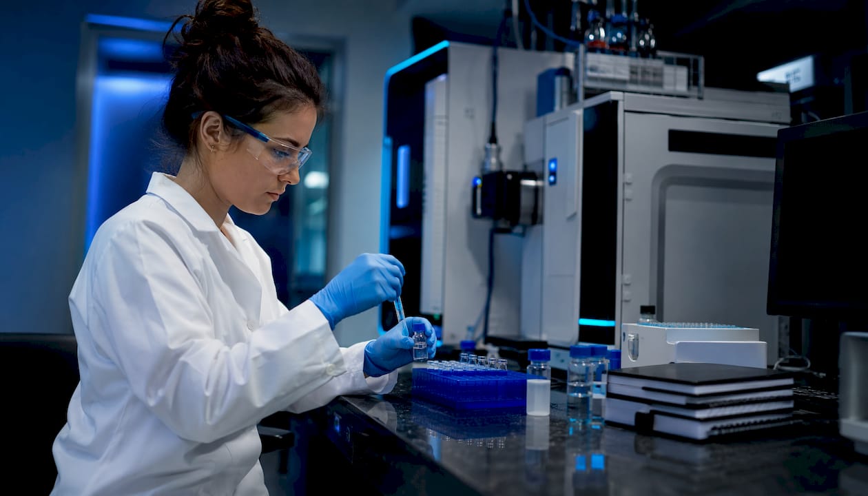 Scientist preparing peptide samples for analysis