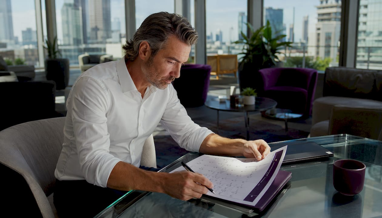 Business leader reviewing tax deadline calendar