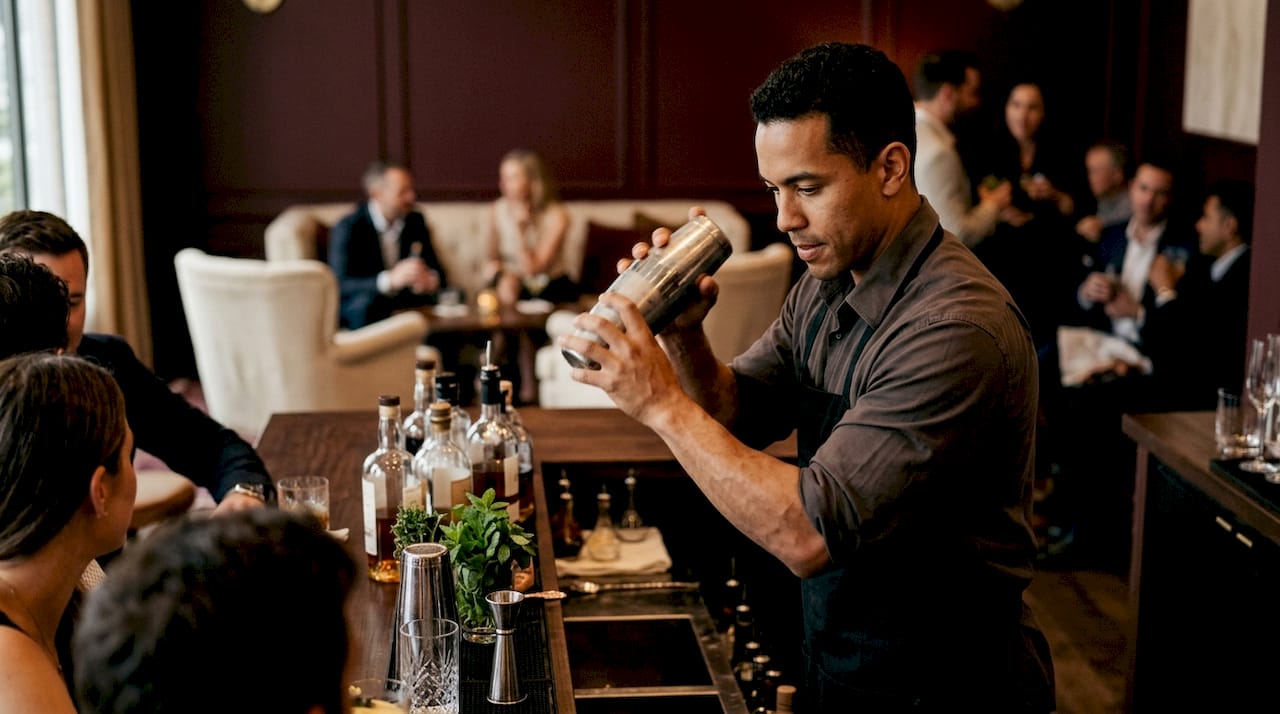 Bartender preparing cocktail during wedding cocktail hour