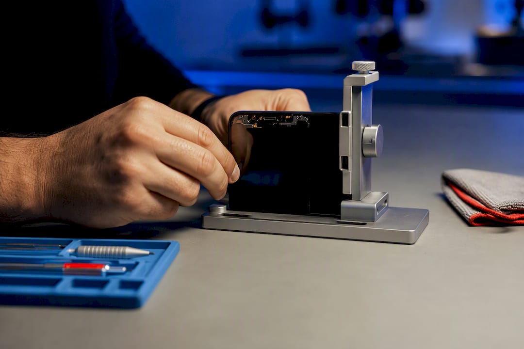 Technician calibrating an anonymous Face ID sensor