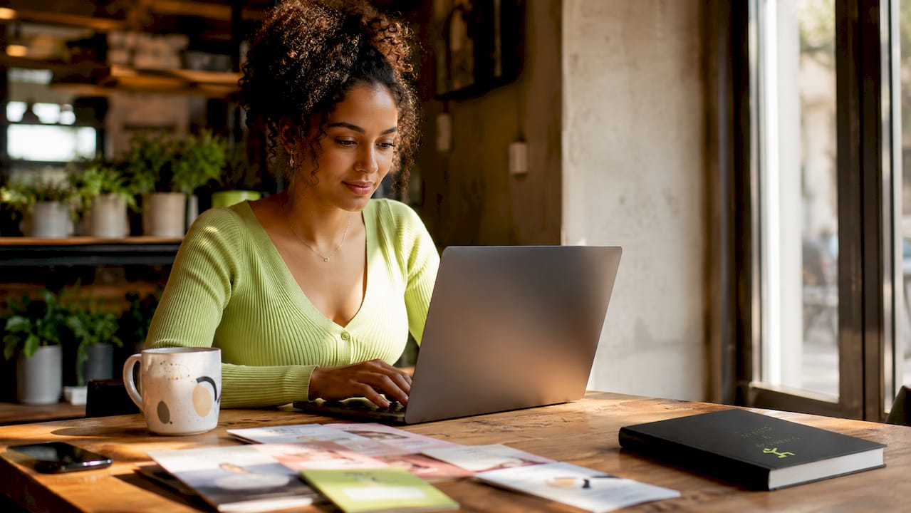 Woman browsing beauty site at home desk