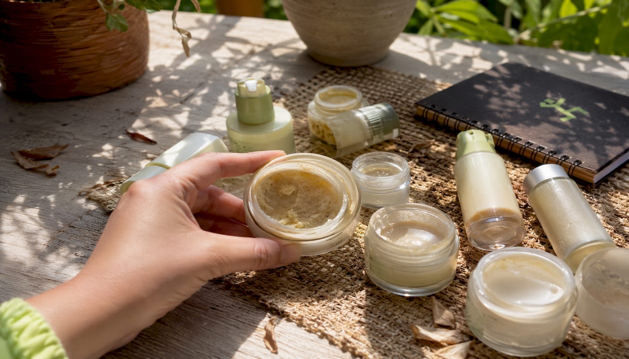 Close-up of expired skincare products on vanity