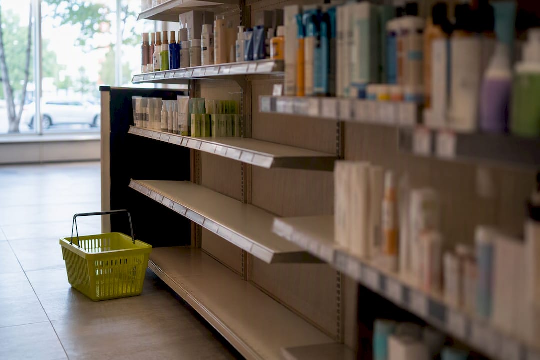 Empty shelves in Bodycare-style store