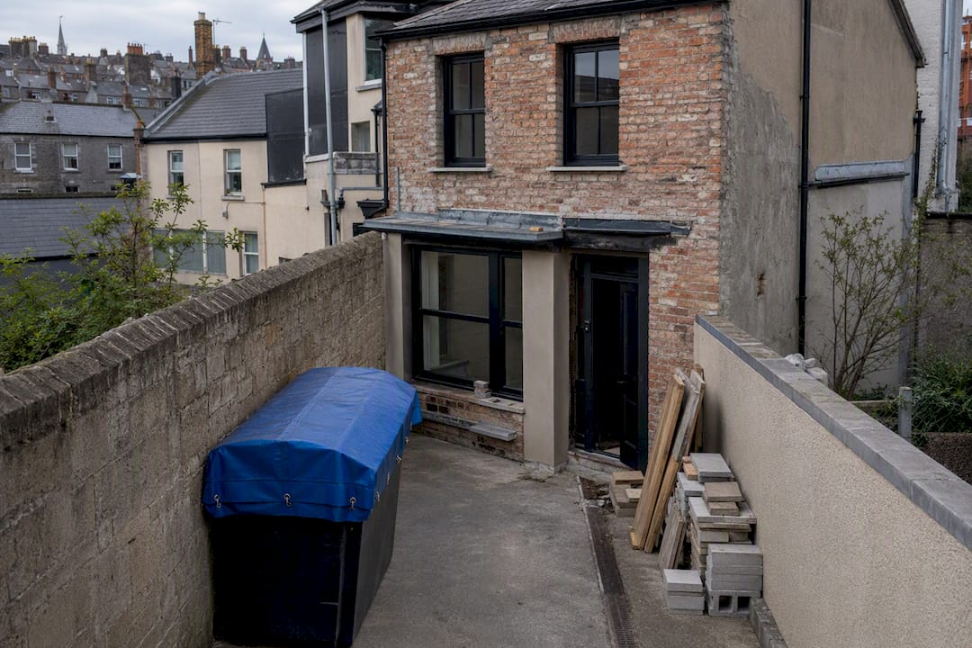 Narrow urban renovation access beside Irish terrace