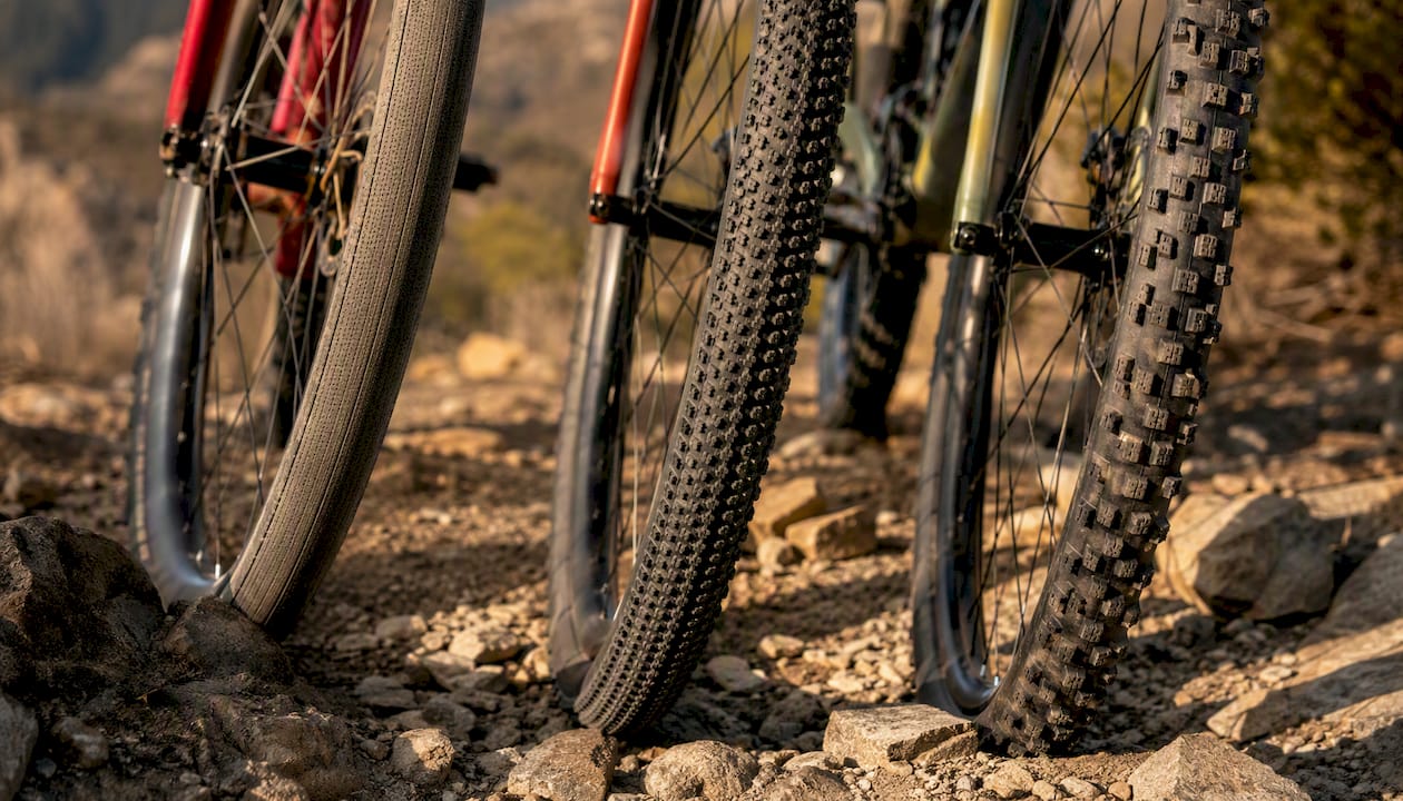 Different gravel bike tire treads on rocky trail