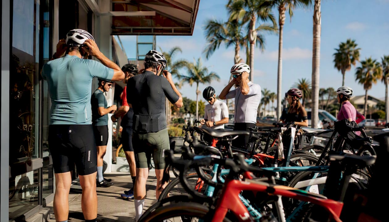 Cyclists prepping bikes outside California bike shop