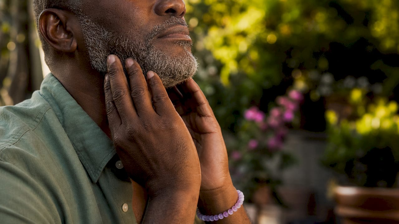 Close-up of hands touching face
