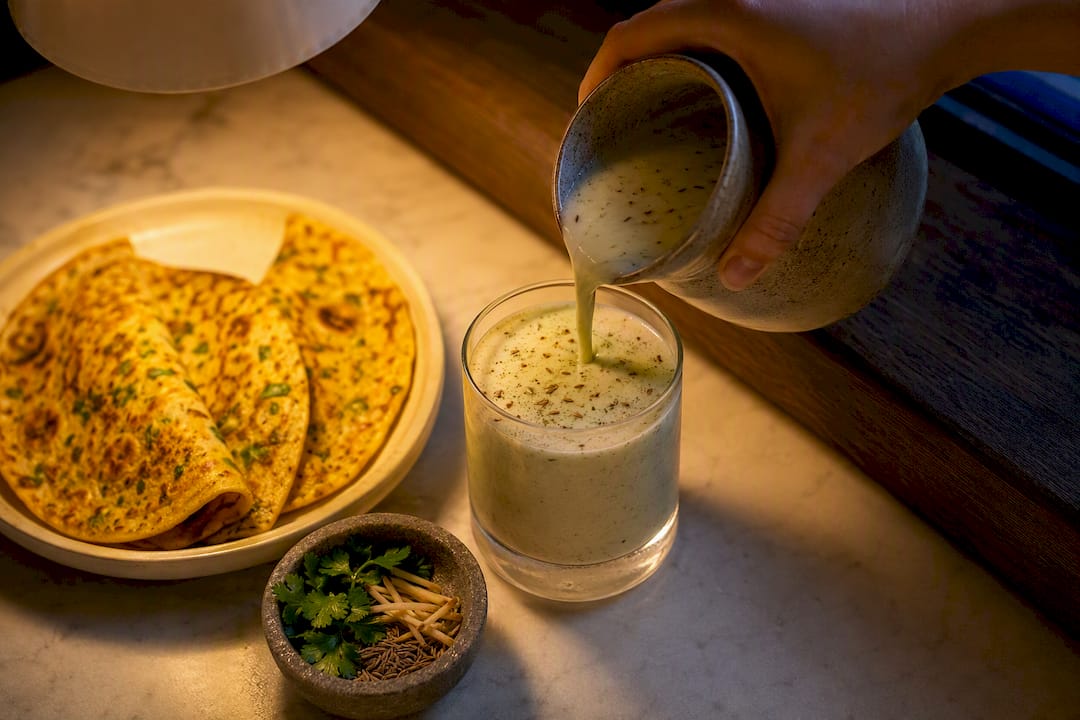 Masala chaas served with besan chilla