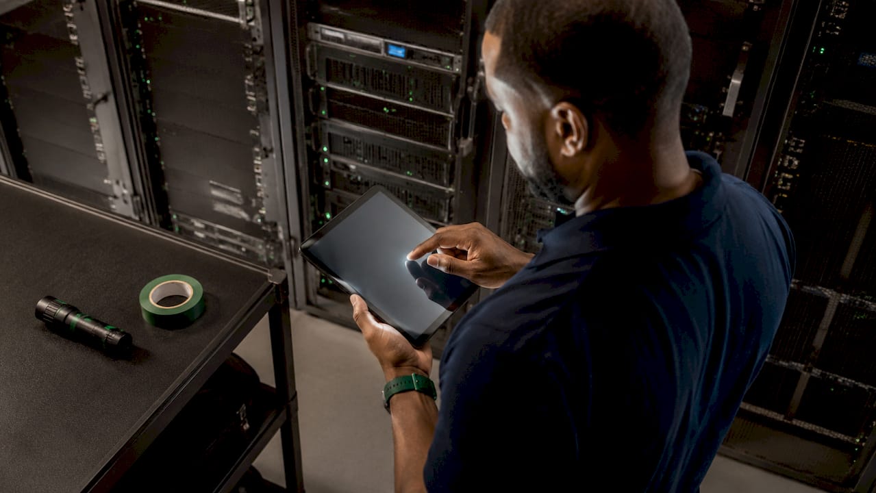 Technician navigating asset discovery on tablet