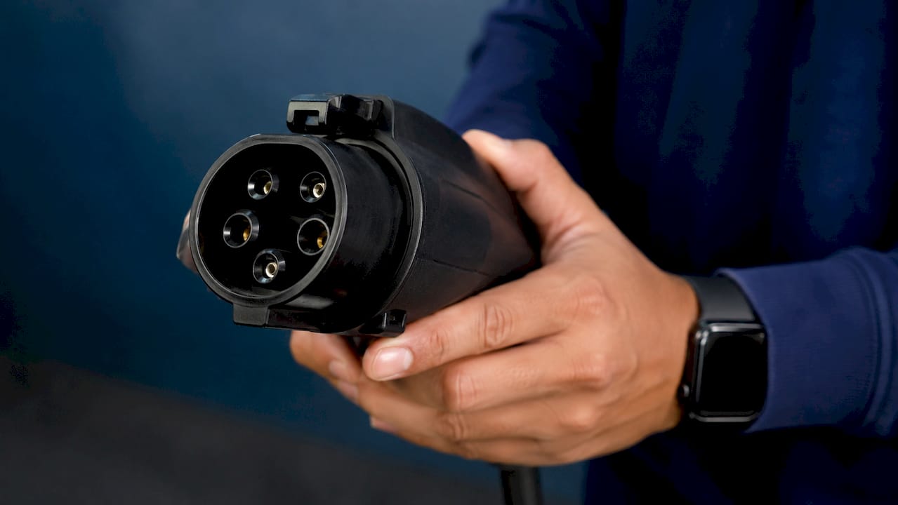 Close-up of J1772 EV charger connector pins