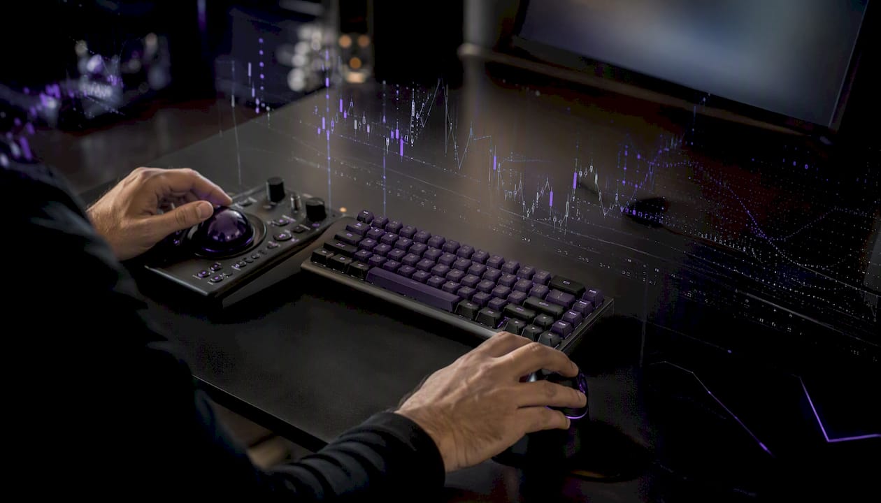 Trader hands adjusting trading controls