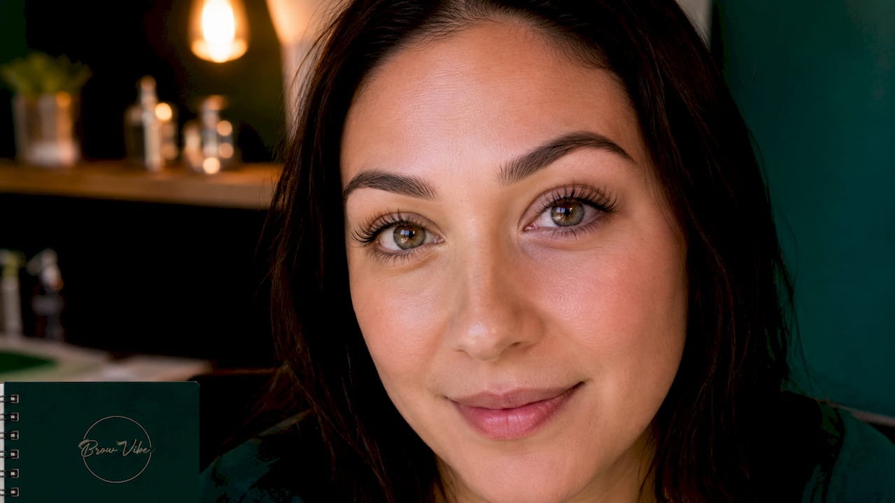 Close-up of eyes with lifted lashes and shaped brows