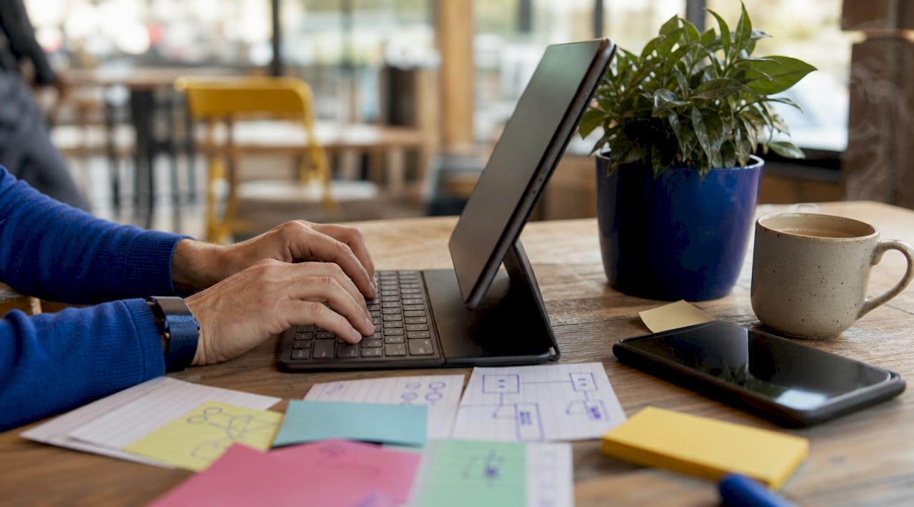 Hands typing and notes on consolidated test data workspace