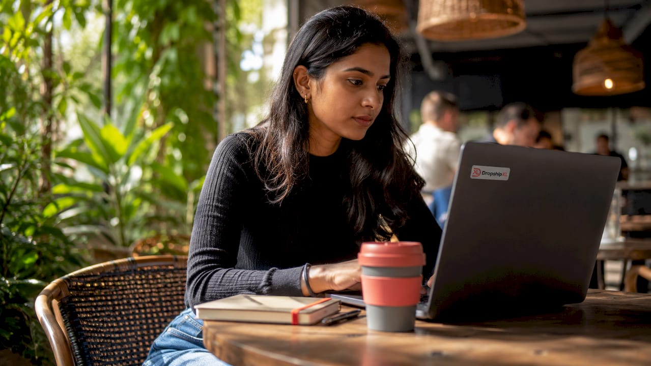 Woman researching niche trends on laptop