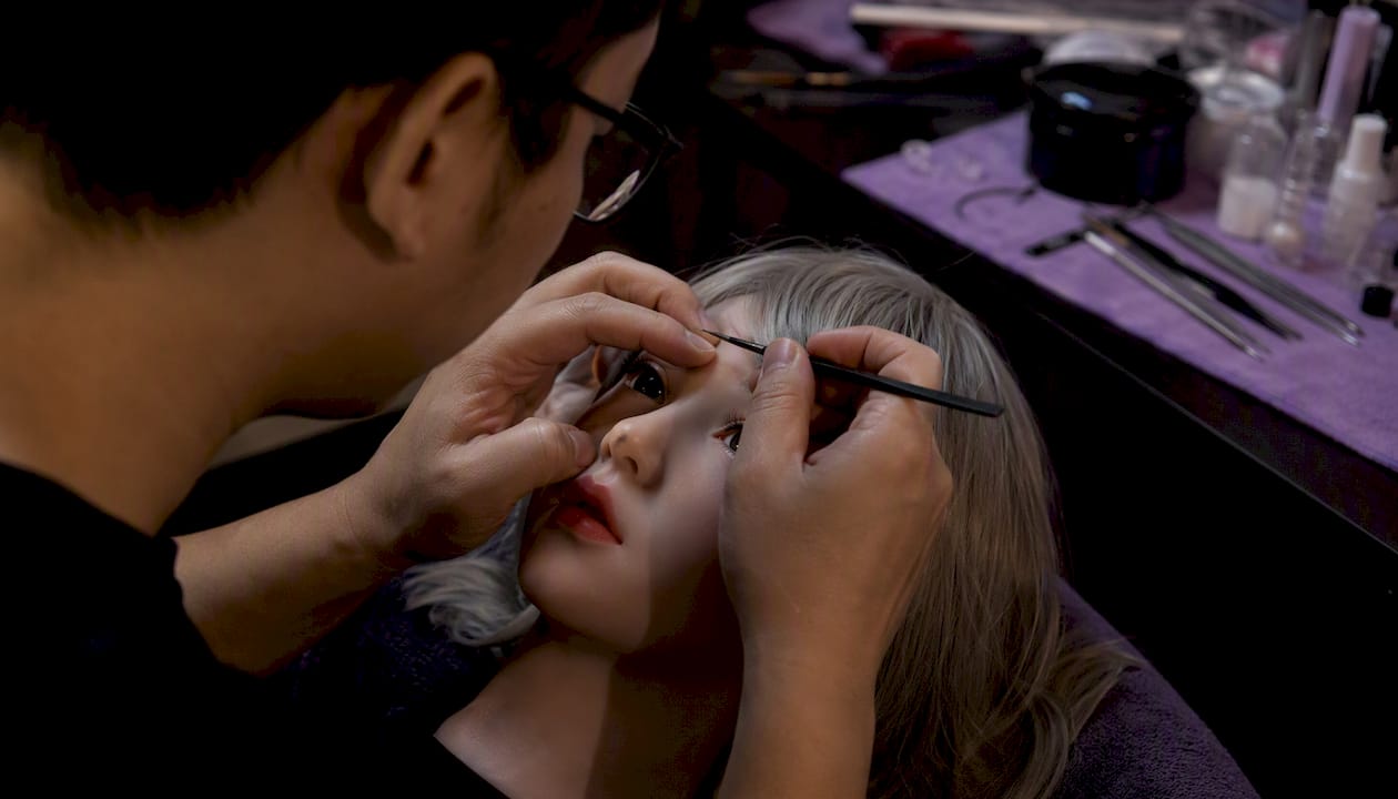 Hands sculpting silicone doll features