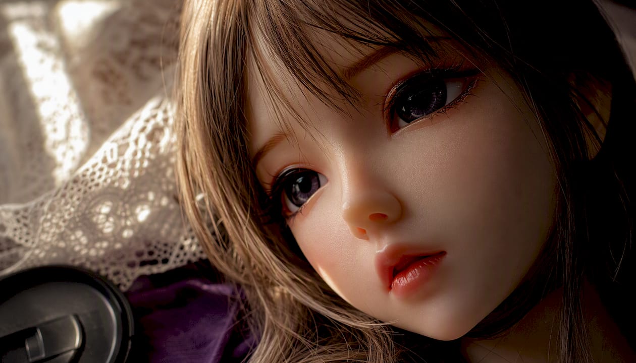 Anime doll face lit by soft natural window light