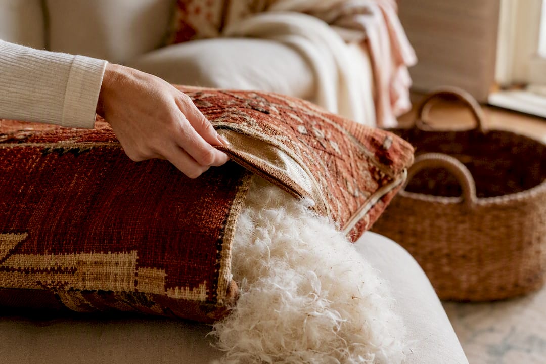Down and feather cushion filling loft close-up
