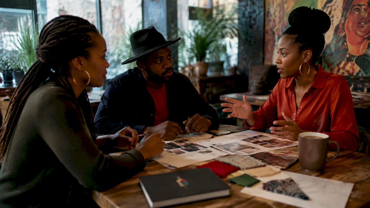 Black professionals collaborating on luxury brand identity