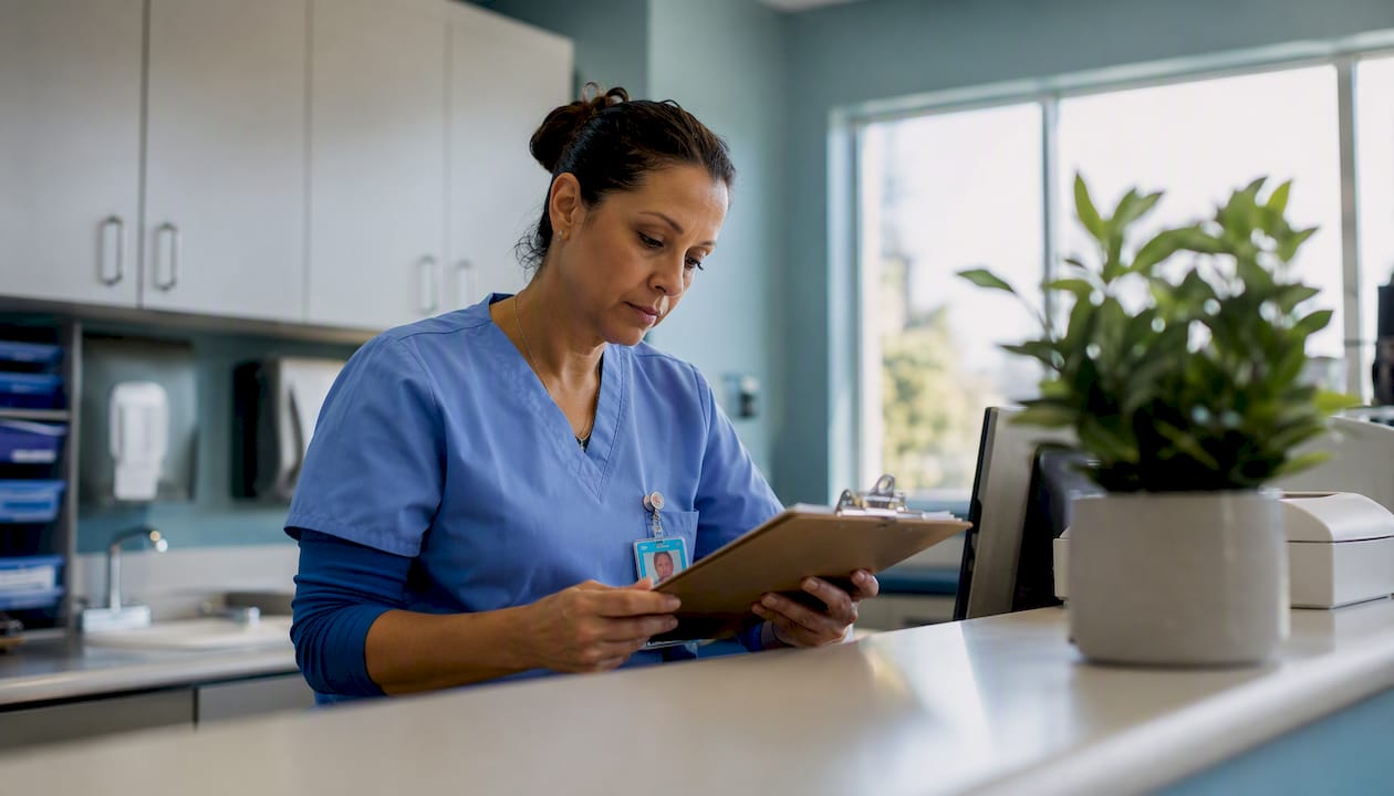Nurse reviewing patient records at detox center
