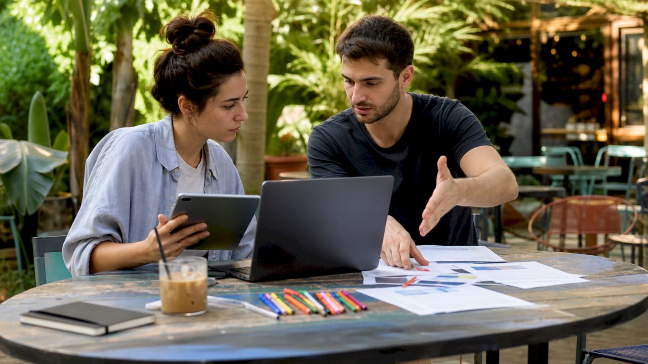 Developers discussing front-end frameworks together