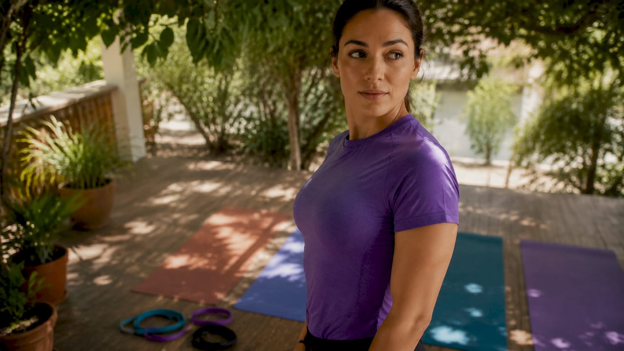 Close-up of athletic shirt sleeve fitting a toned arm