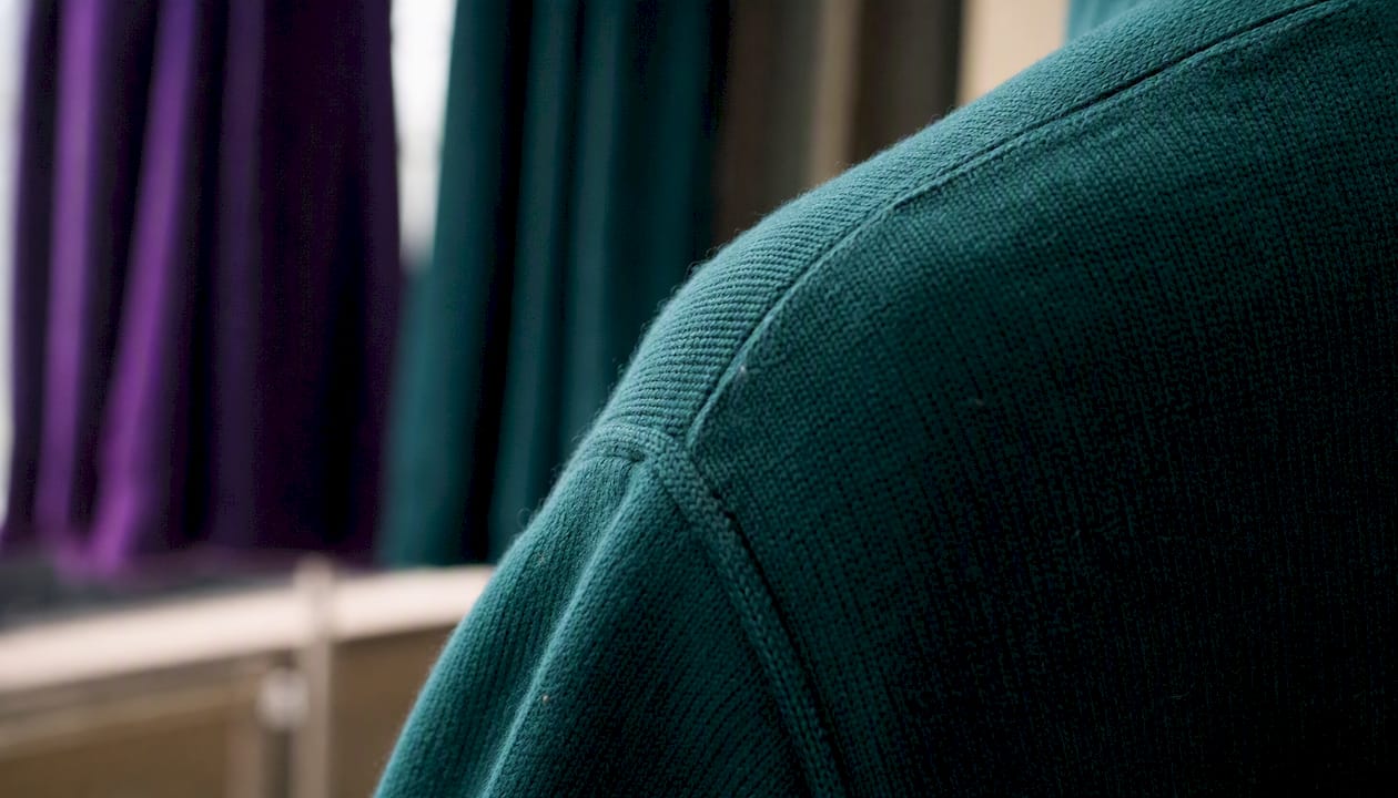 Close-up of midweight sweater knit and seam