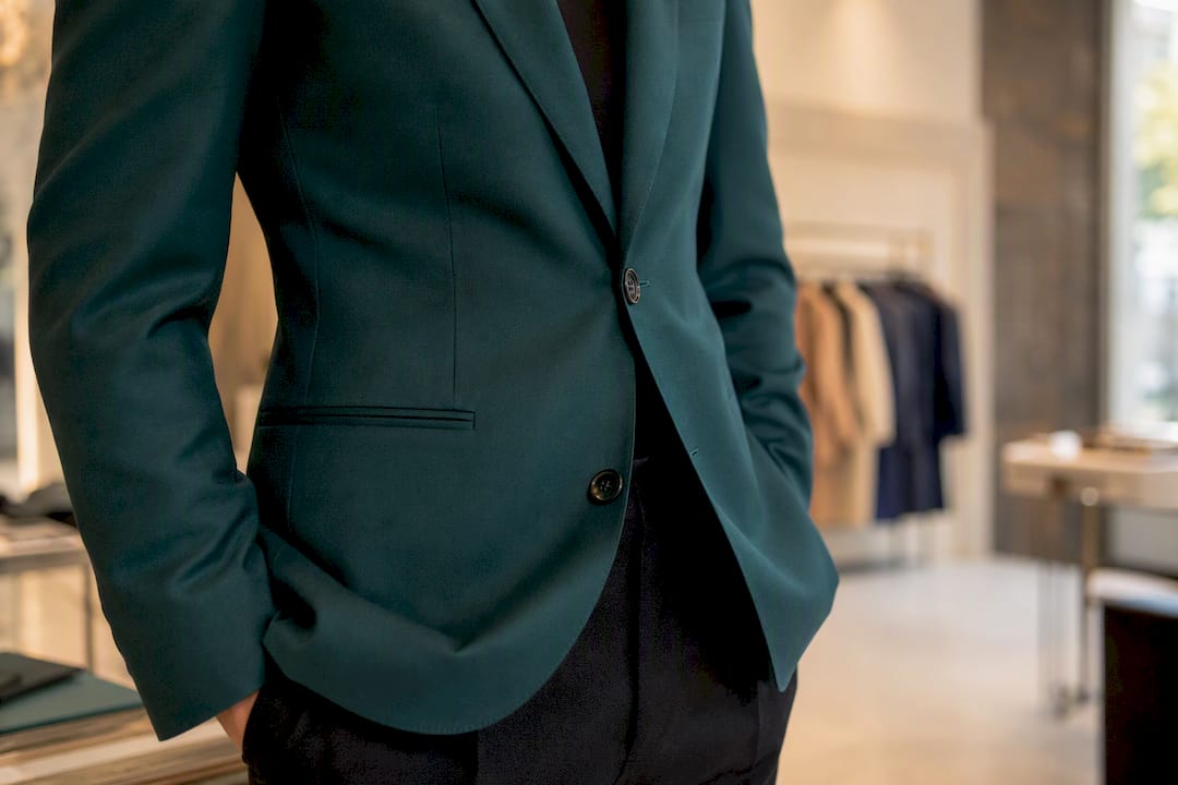 Suit jacket waist with top button fastened