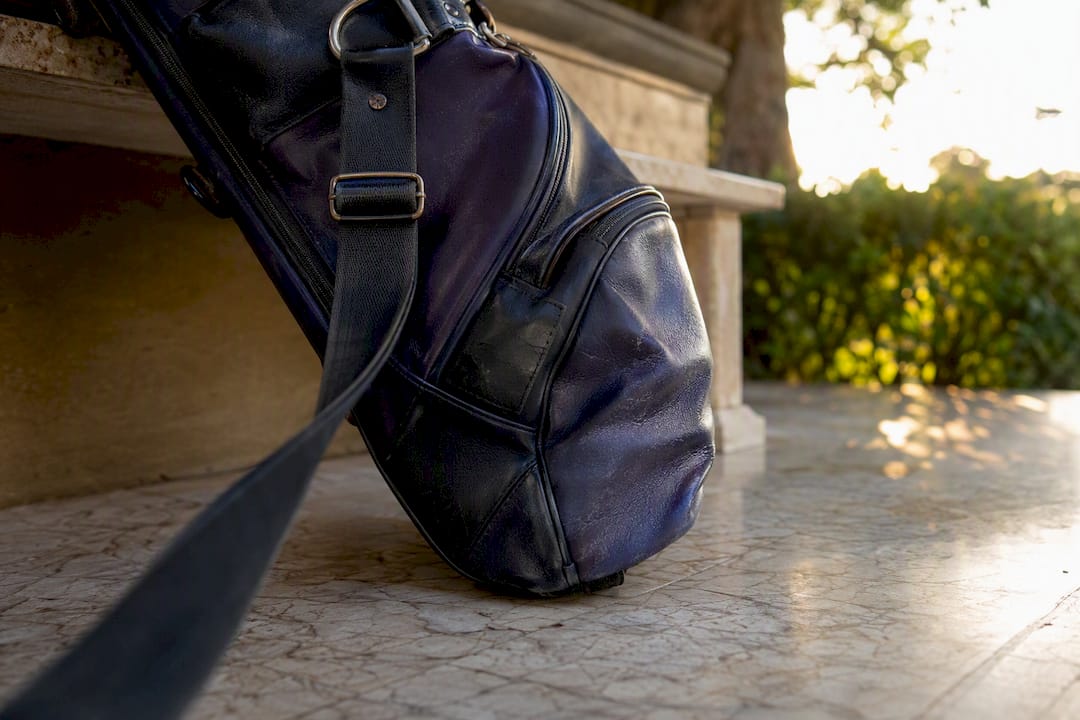 Worn abrasion and creased pocket fabric by cart strap