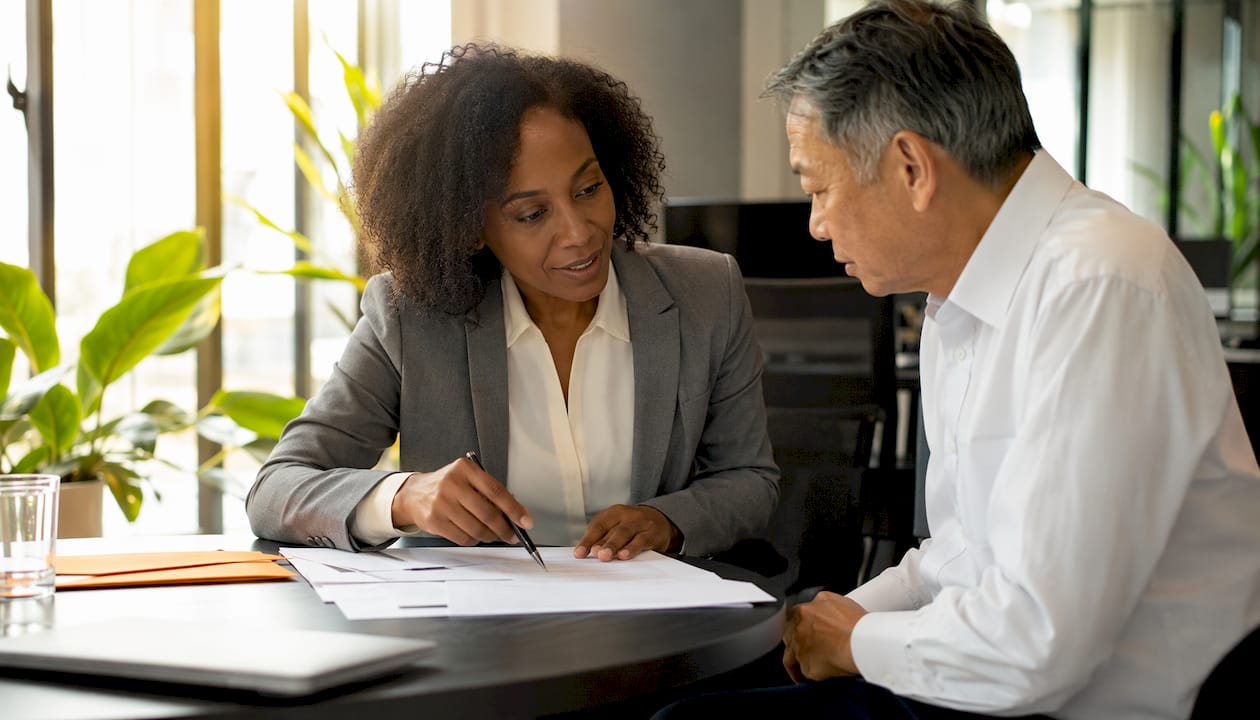 Logistics professionals negotiating freight rates in meeting