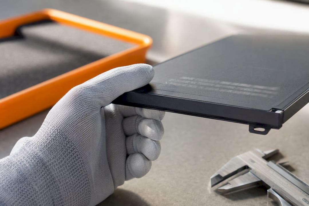 Close-up of battery casing inspection