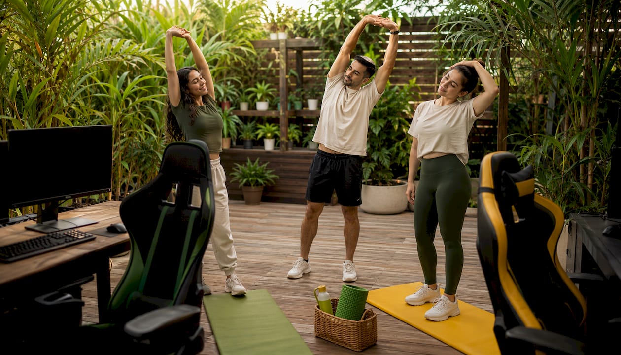 Group doing stretches during gaming break