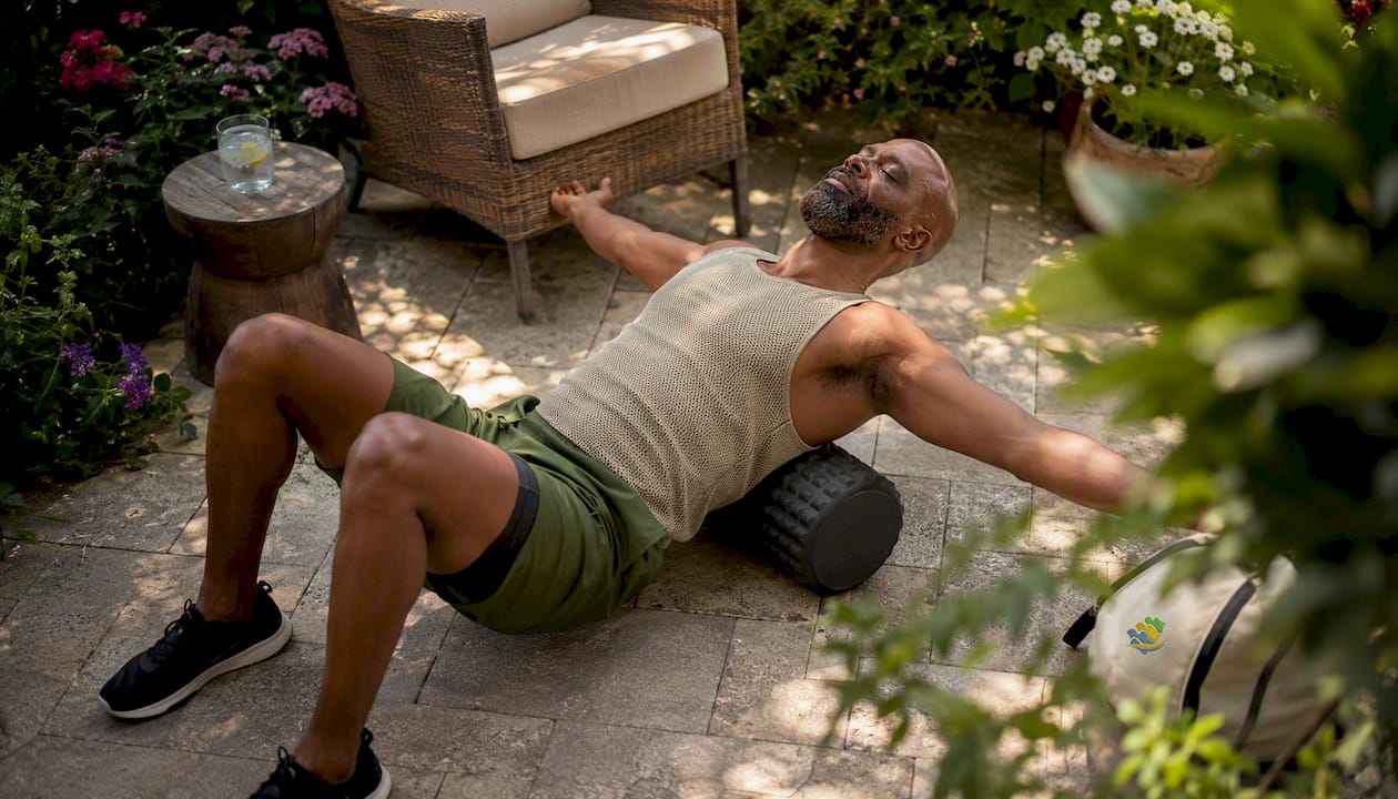 Man performing foam roller chest opener stretch