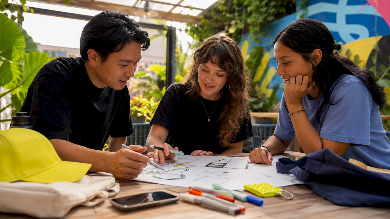 Diverse team discussing unique branded merchandise ideas