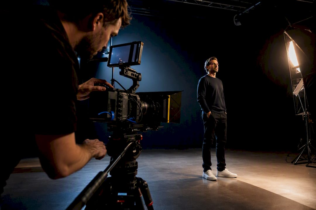 Film crew capturing a corporate video scene