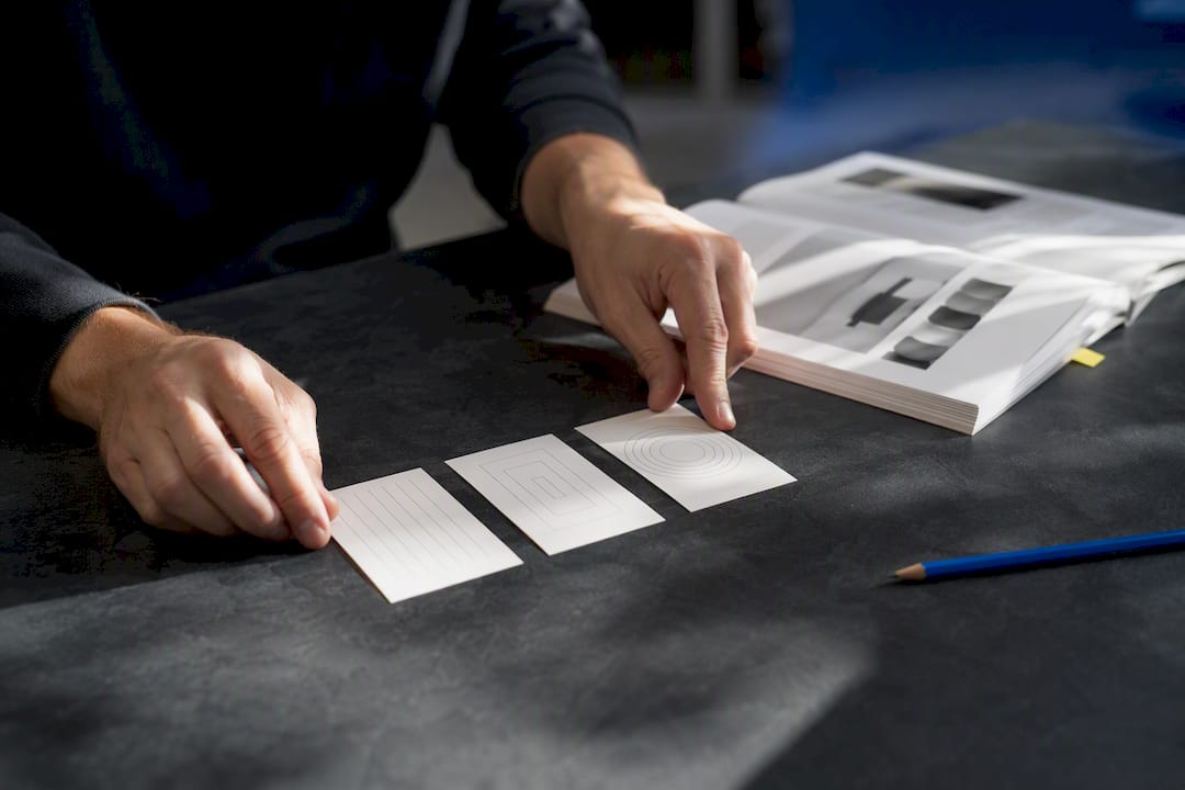 Editor arranging brand voice style guide cards