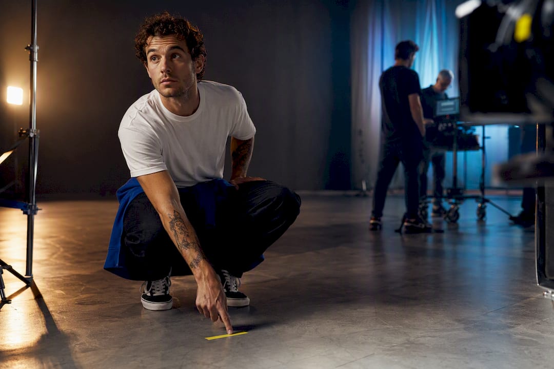 Performer rehearsing on a commercial production set