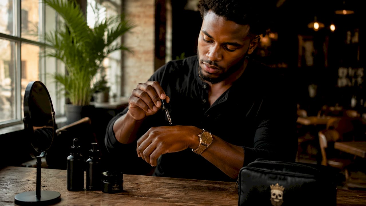 Hands applying niacinamide serum skincare
