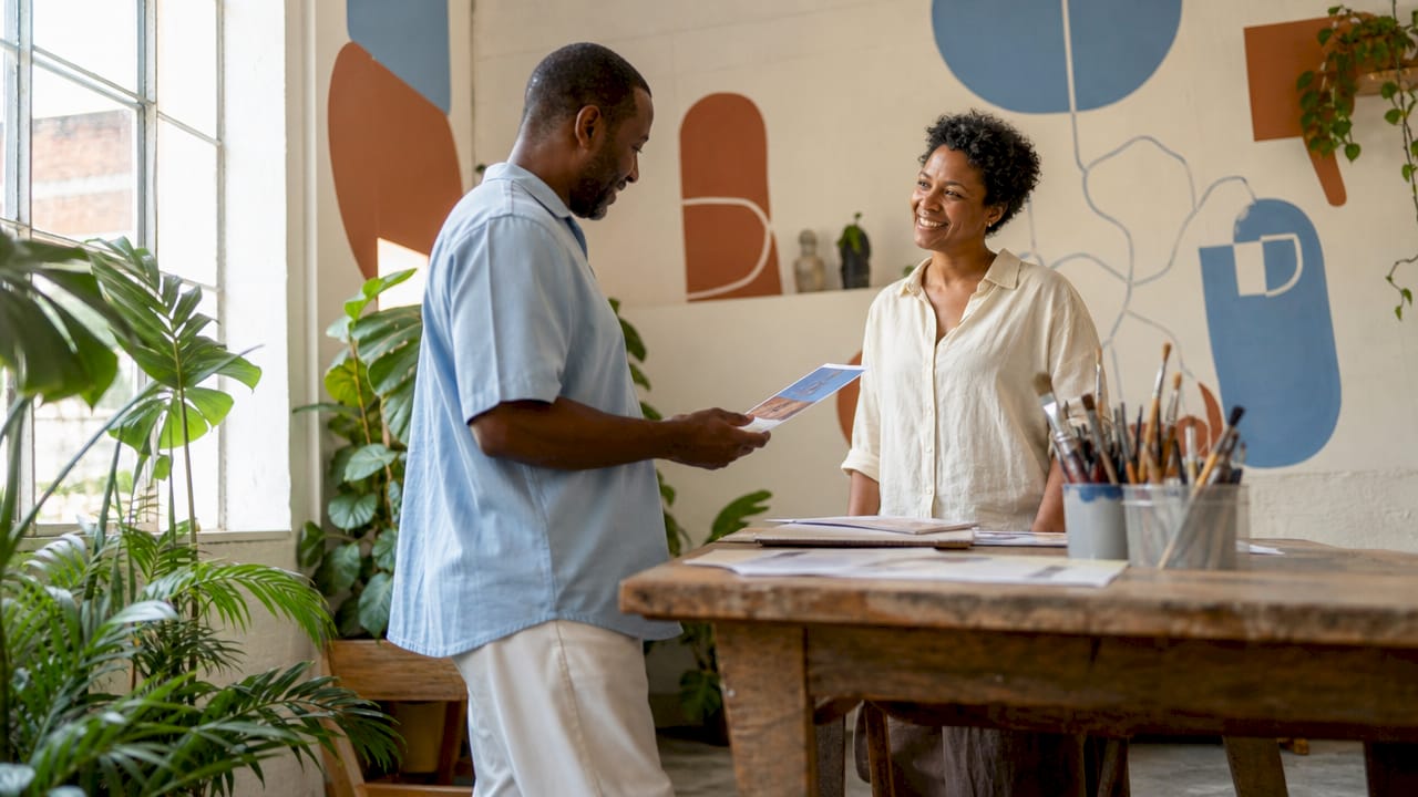 Visitor registering for art studio event
