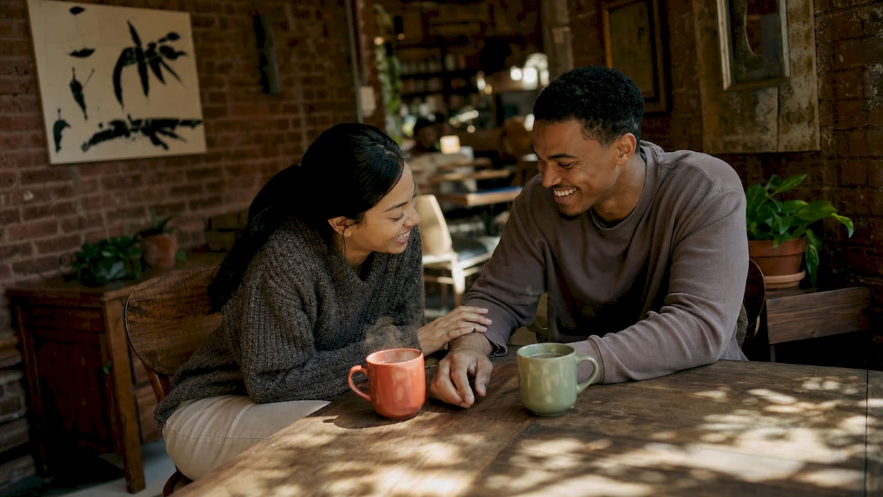 Couple sharing morning affectionate gesture