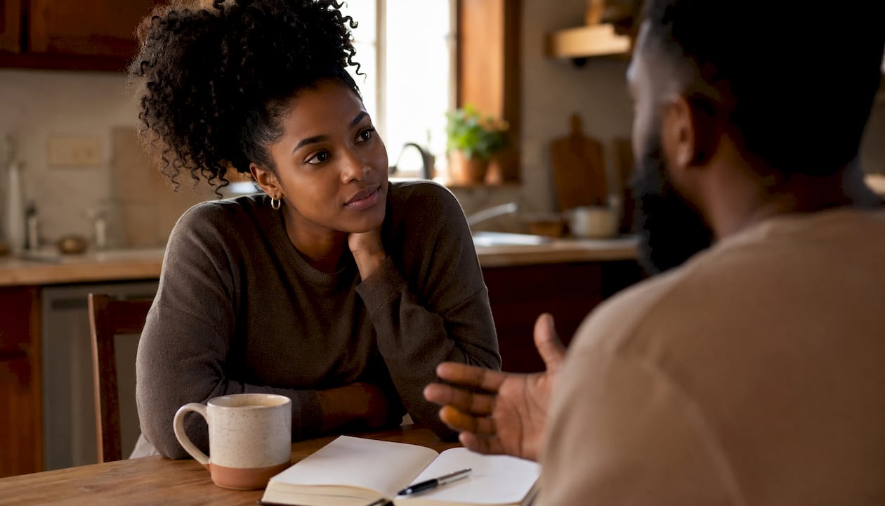 Woman attentively listening in café