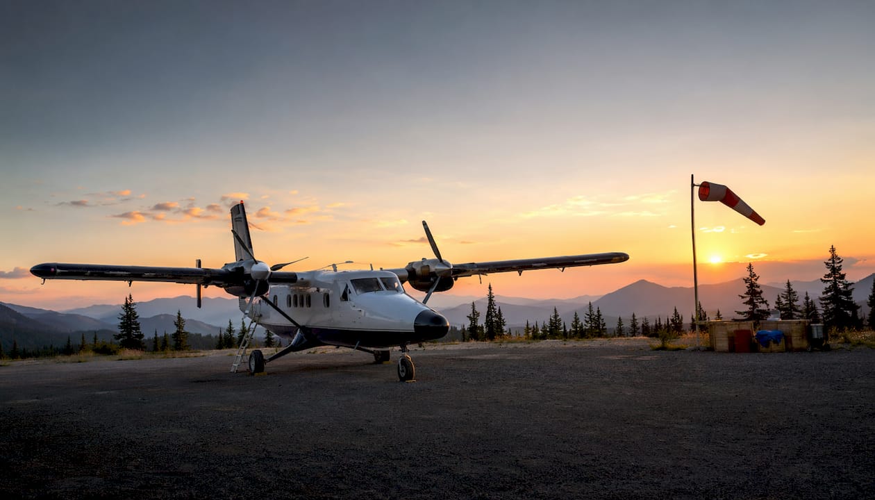 De Havilland Twin Otter on grassy mountain airfield