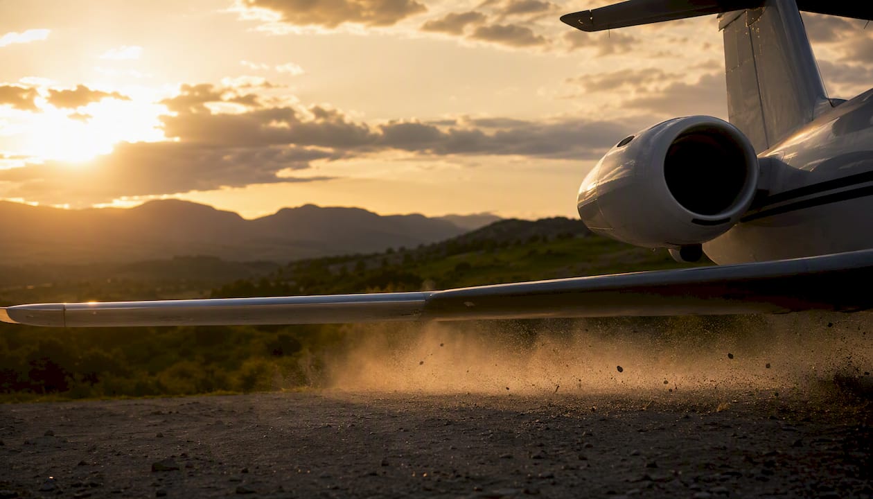 Private jet landing on remote short runway
