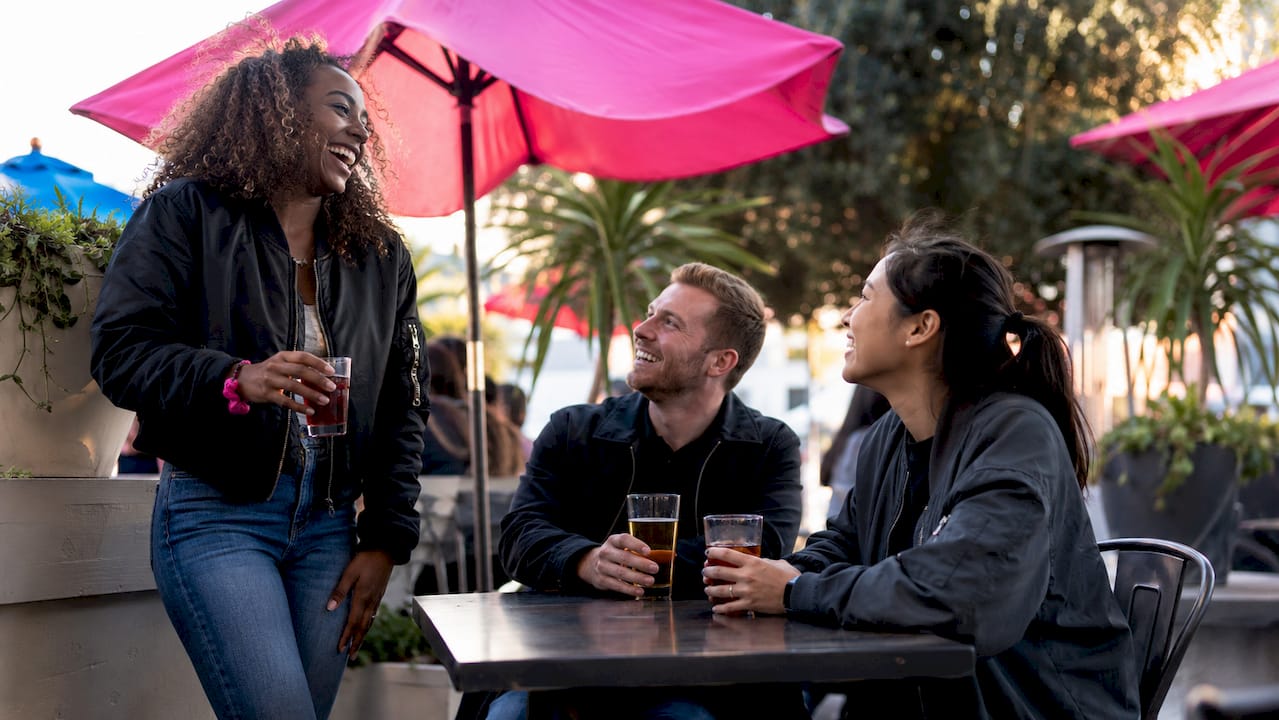 Service members casually dressed blending in crowd outdoors