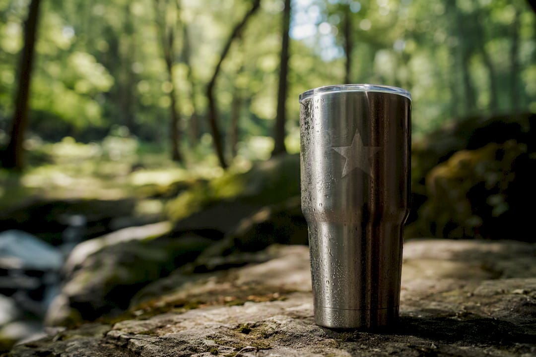 Engraved stainless steel tumbler outdoors