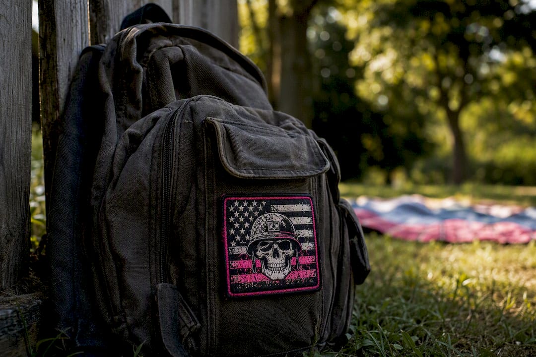 Close-up of embroidered veteran patch on backpack strap
