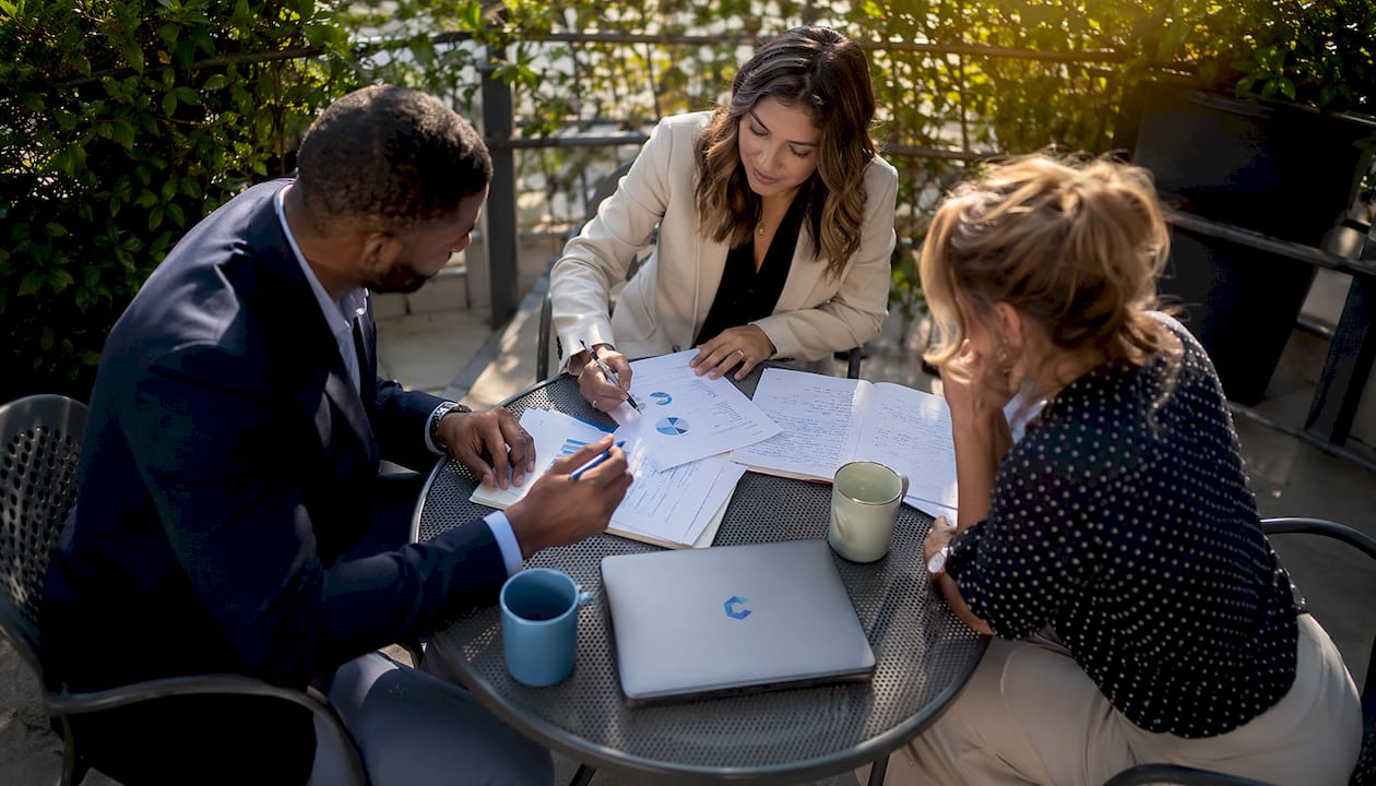 Diverse team discussing acquisition thesis criteria